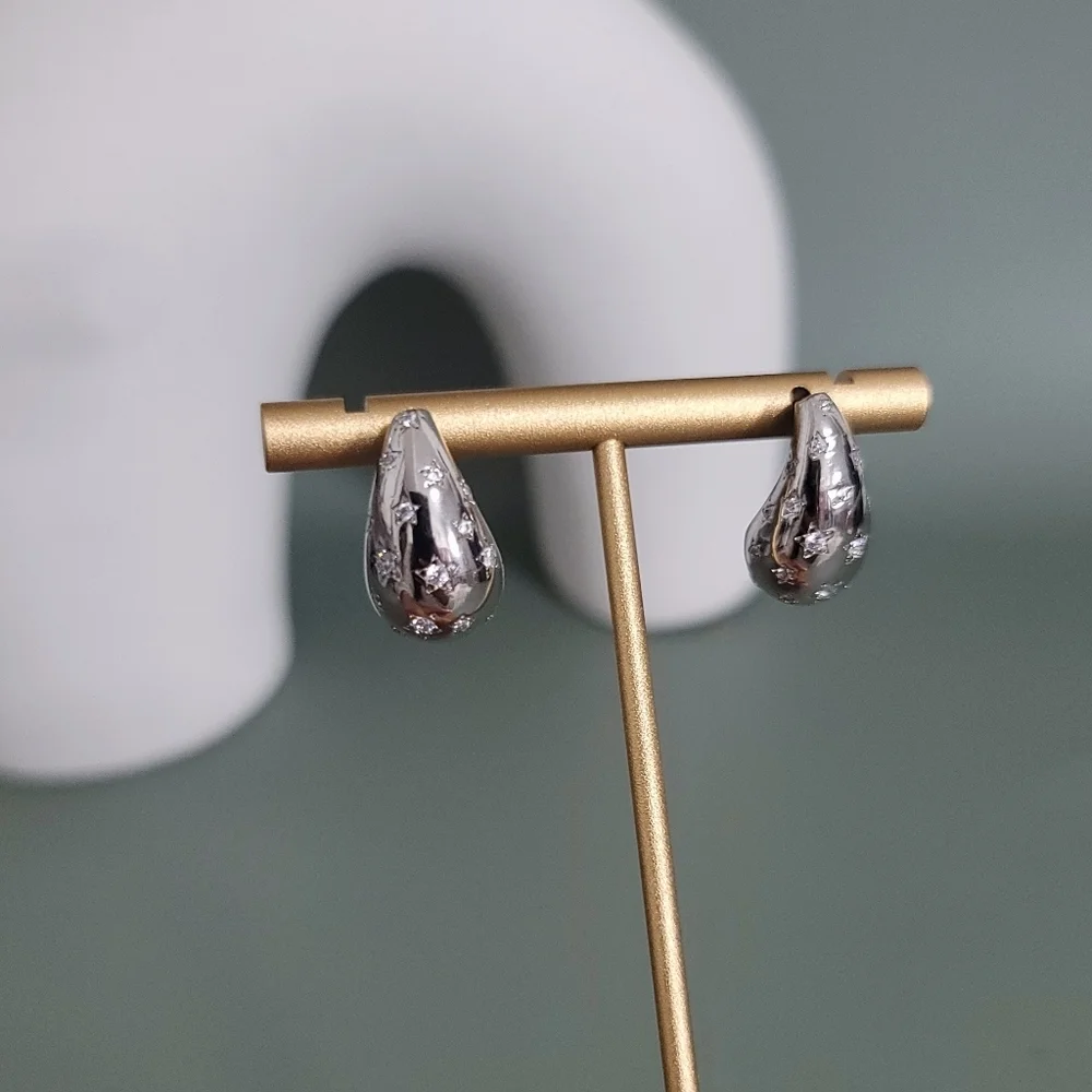 Stainless steel silver tone small star tear drop earrings